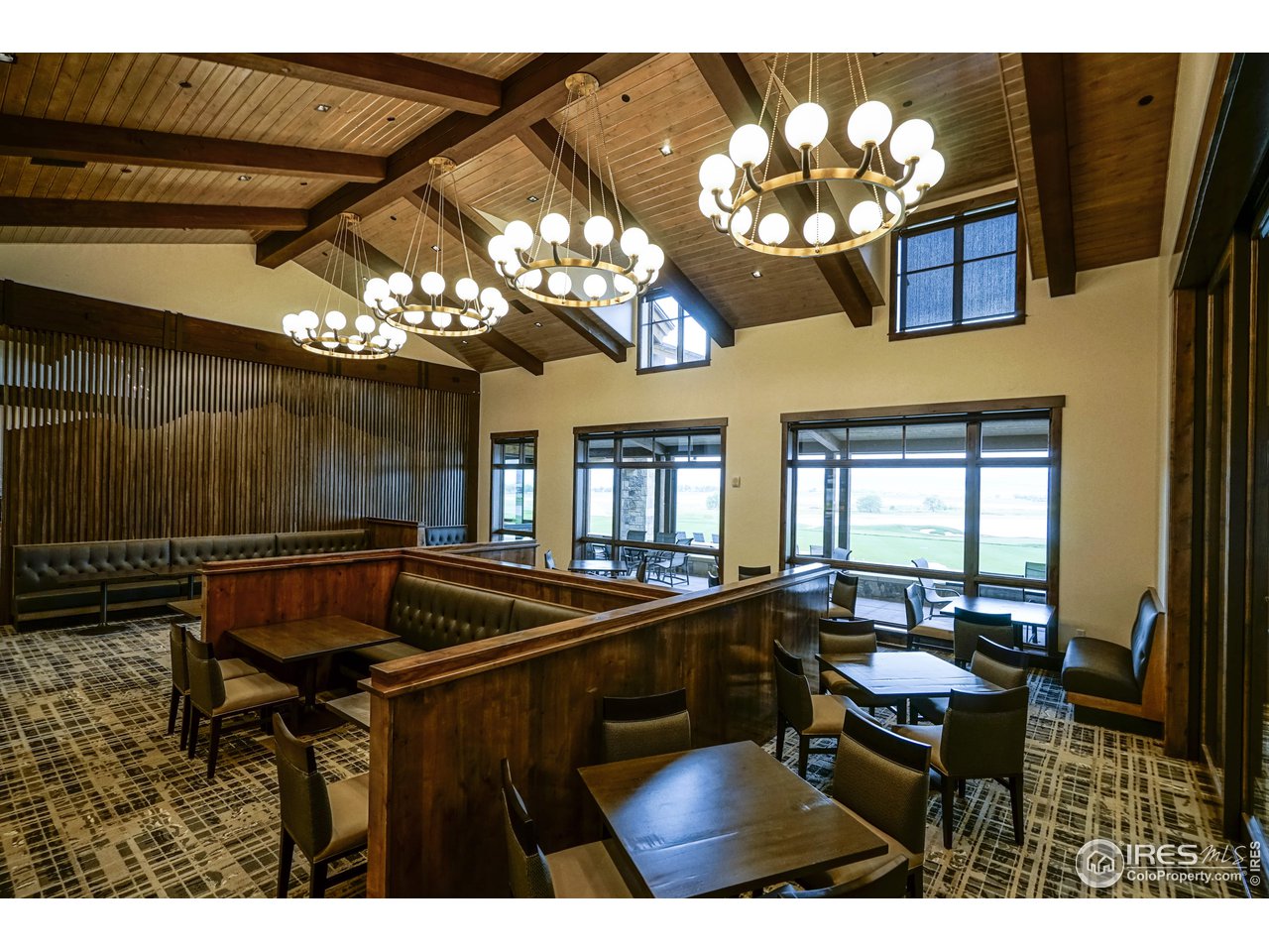2553 Southwind Road Berthoud, CO 80513 - Photo 6 of 14 a view of a dining room with furniture and chandelier