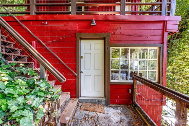 a view of a red door of the house