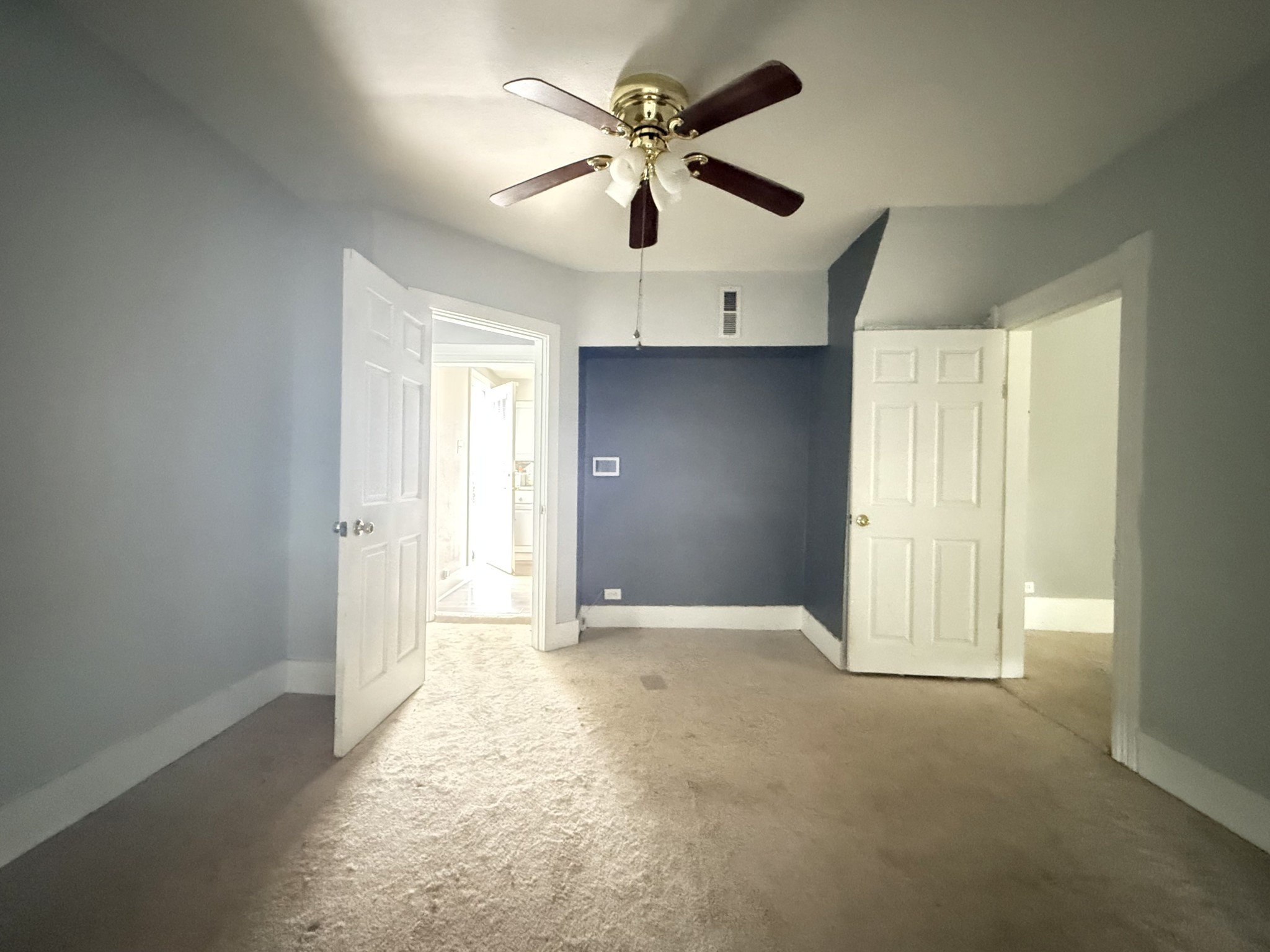 2844 Jarman Hollow Road Palmyra, TN 37142 - Photo 16 of 32 a view of an empty room with a ceiling fan and window