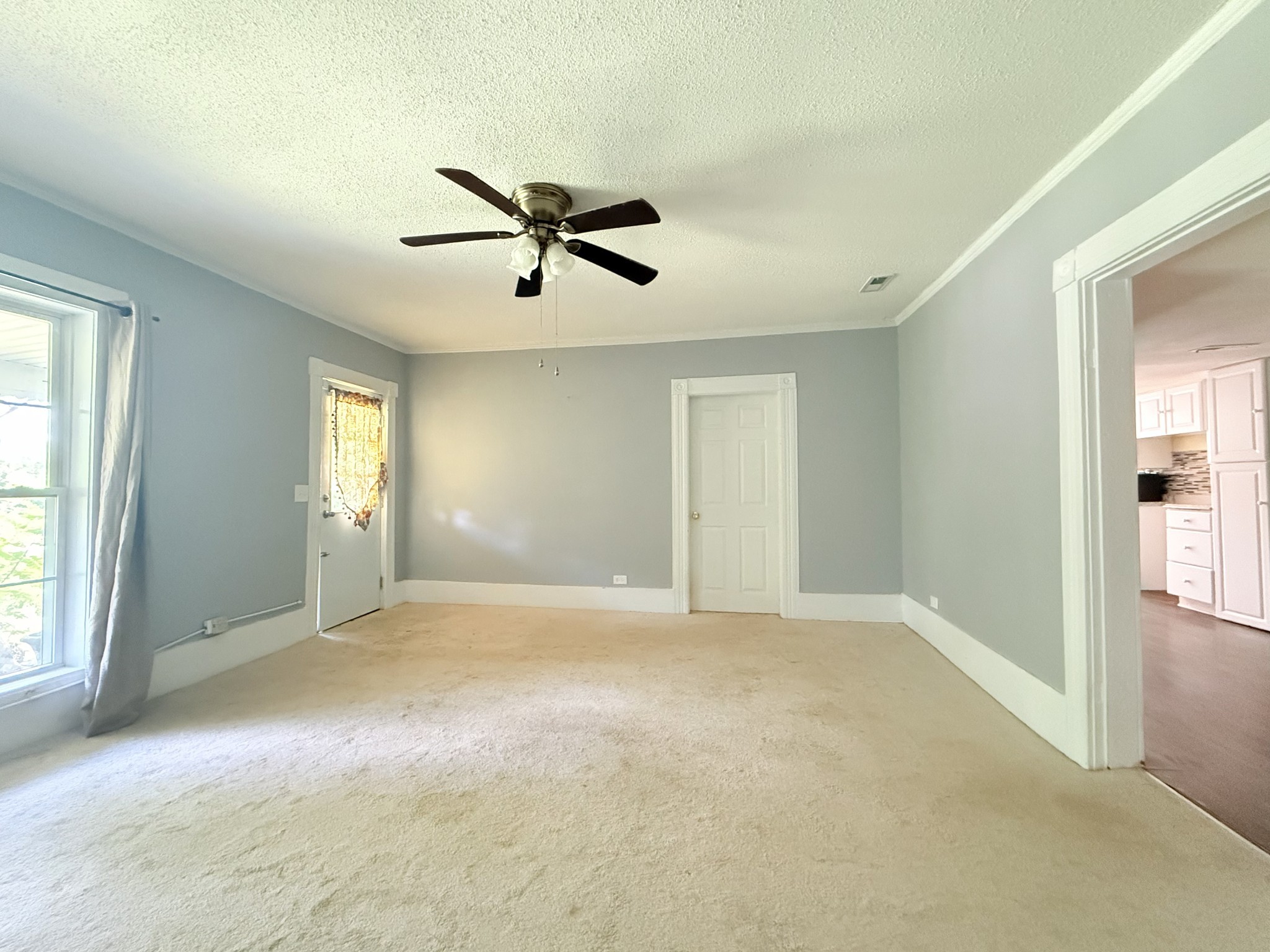2844 Jarman Hollow Road Palmyra, TN 37142 - Photo 21 of 32 a view of a big room with windows and cabinet