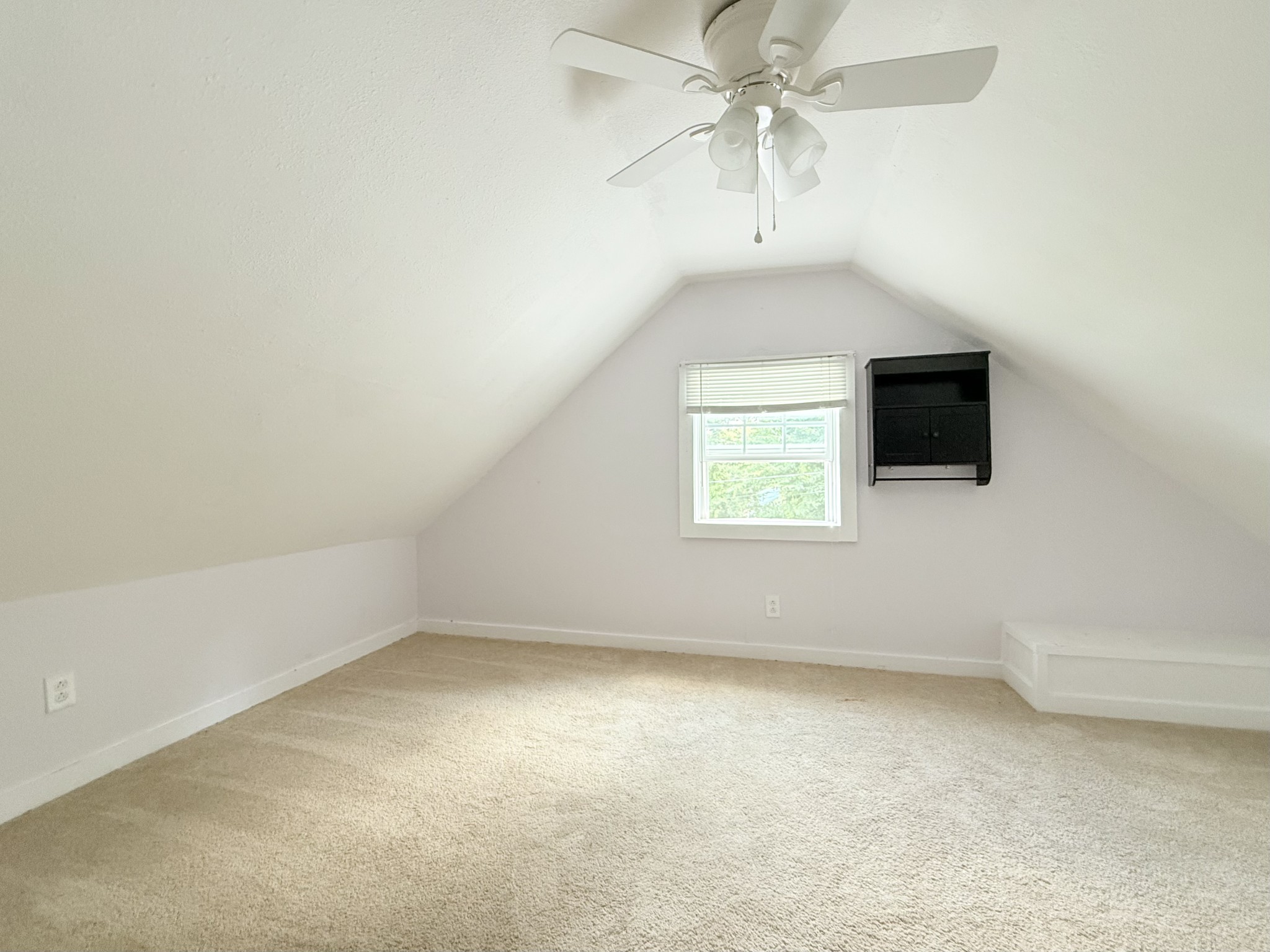 2844 Jarman Hollow Road Palmyra, TN 37142 - Photo 22 of 32 an empty room with a window and a fan