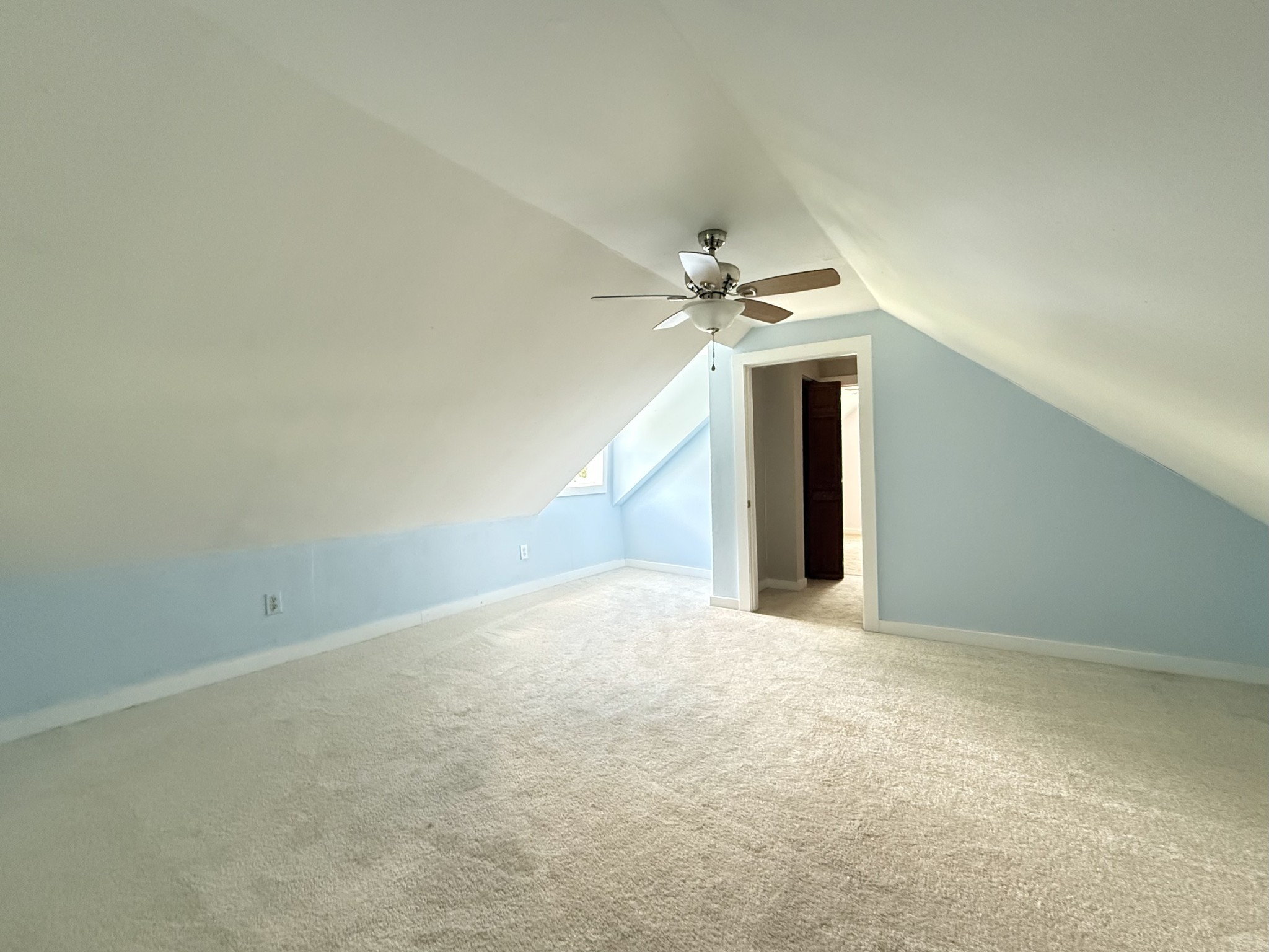 2844 Jarman Hollow Road Palmyra, TN 37142 - Photo 25 of 32 an empty room with a ceiling fan and window