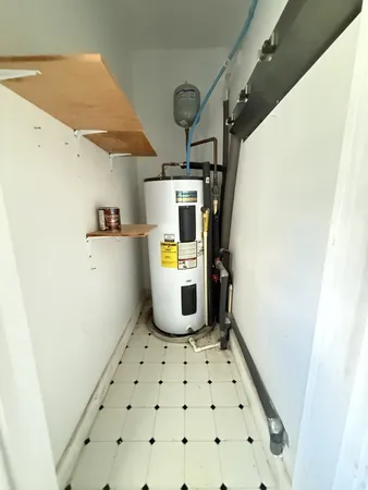 a view of a storage & utility room with washer and dryer