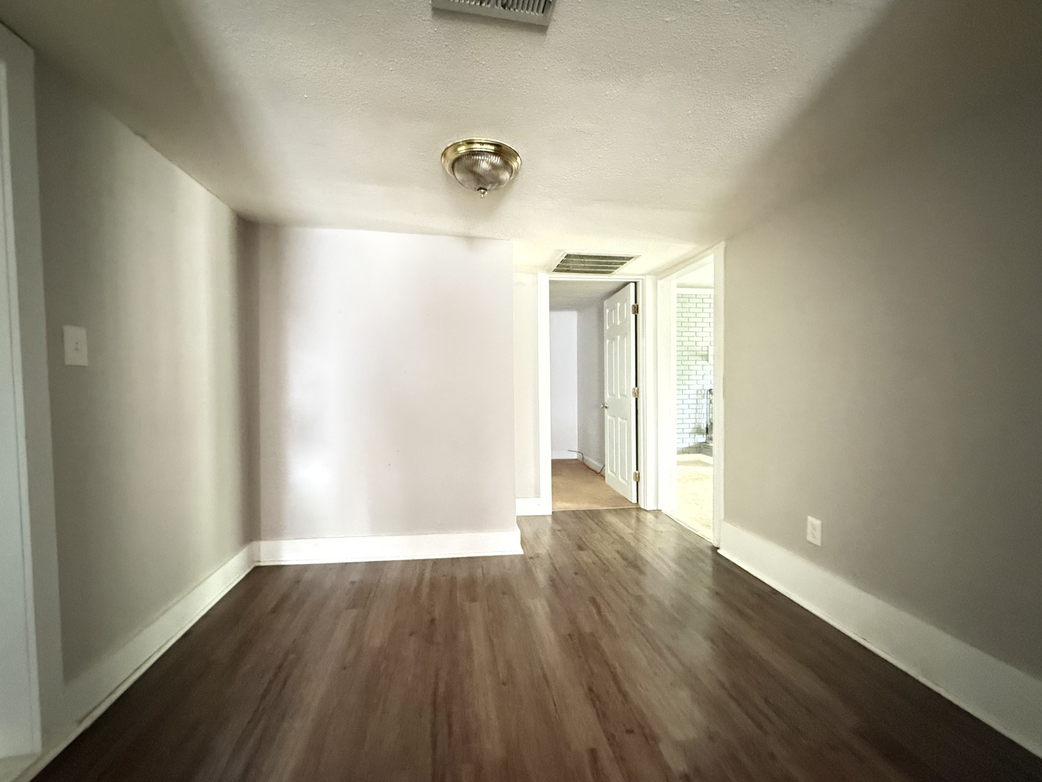 2844 Jarman Hollow Road Palmyra, TN 37142 - Photo 8 of 32 a view of a livingroom with wooden floor