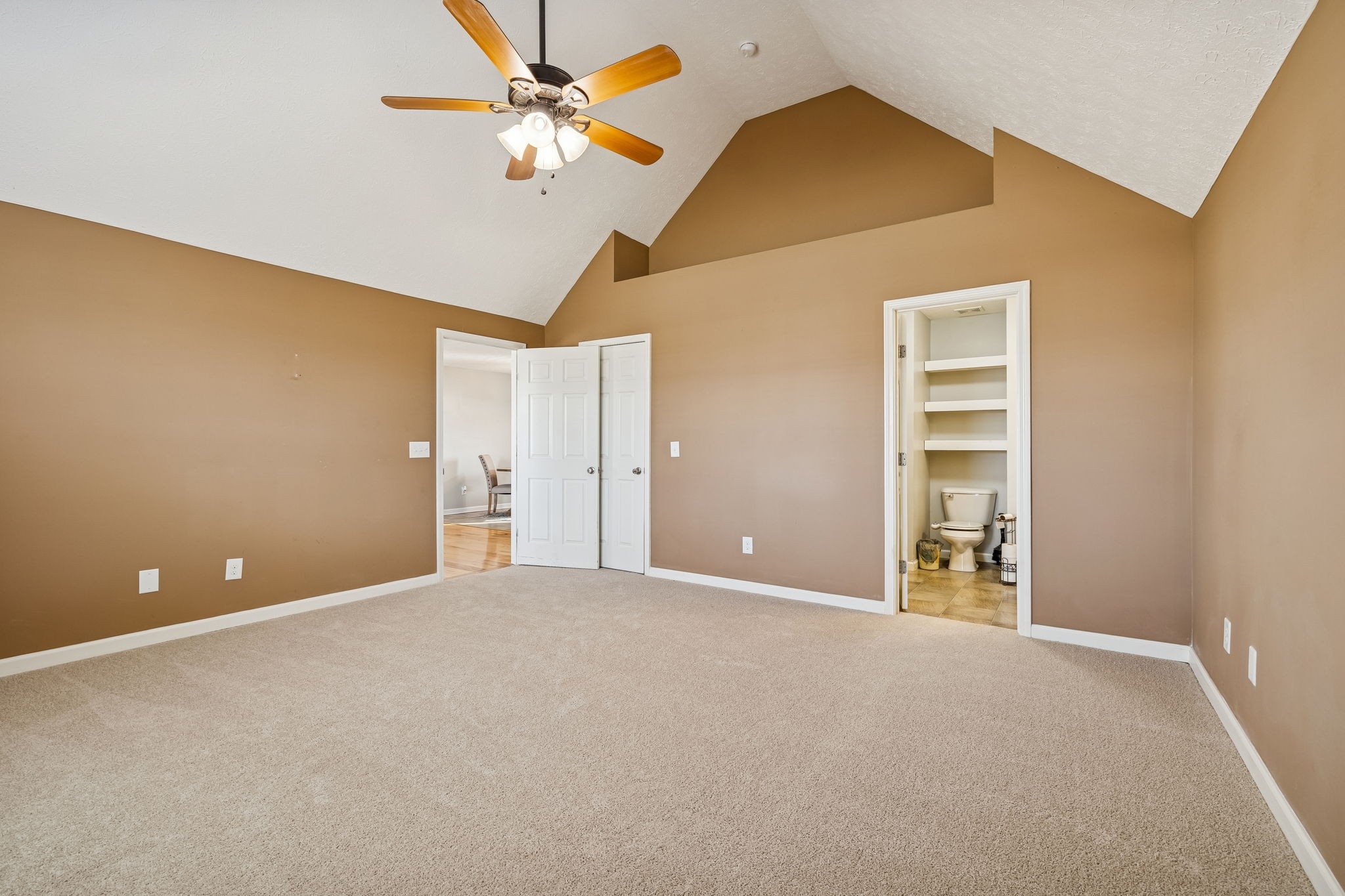 136 Thacker Drive Portland, TN 37148 - Photo 16 of 39 a view of an empty room with a ceiling fan