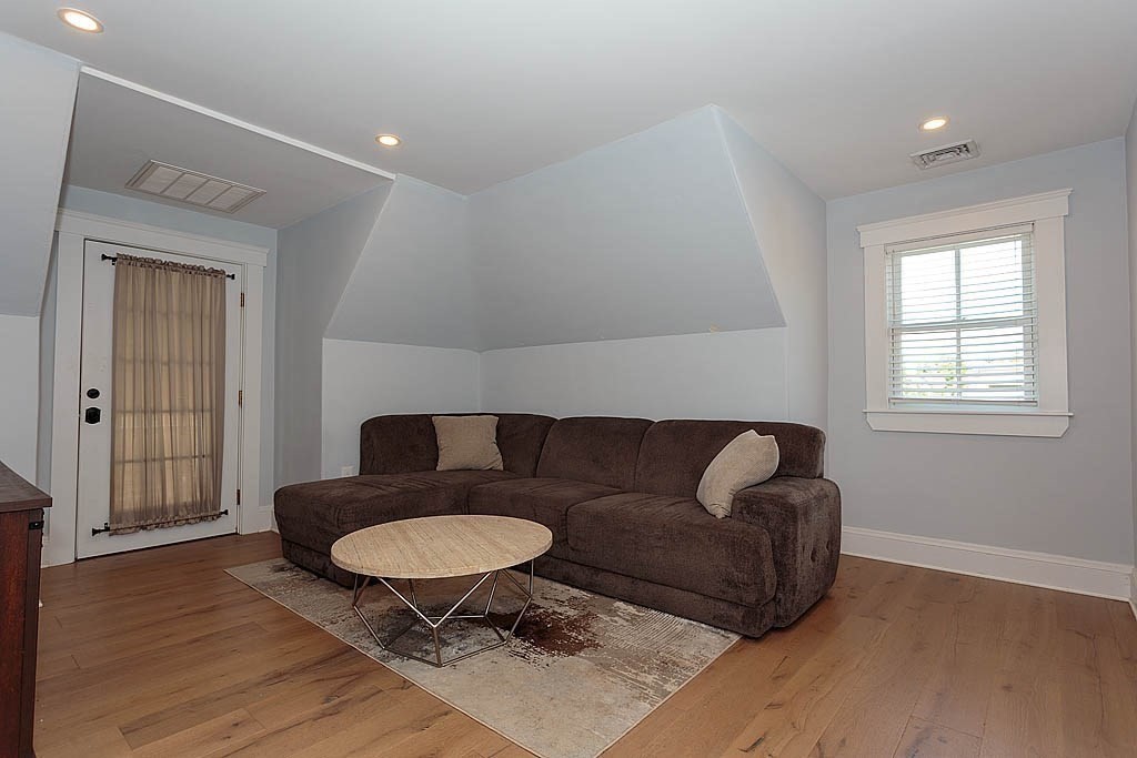 79 Robert Street, Unit 3 Boston, MA 02131 - Photo 14 of 20 a living room with furniture and a window