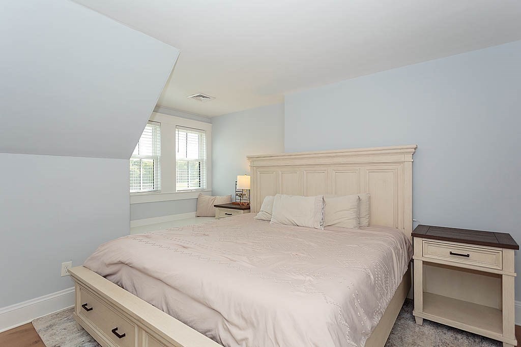 79 Robert Street, Unit 3 Boston, MA 02131 - Photo 15 of 20 a bedroom with a bed and a window