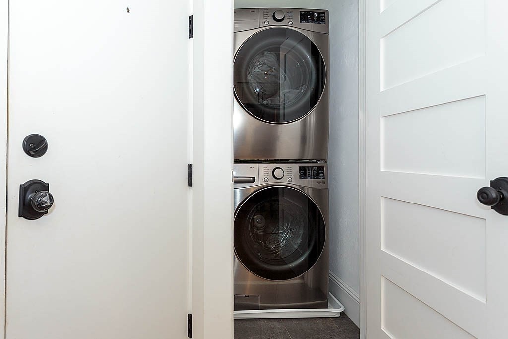 79 Robert Street, Unit 3 Boston, MA 02131 - Photo 5 of 20 a view of a storage & utility room with a washer dryer