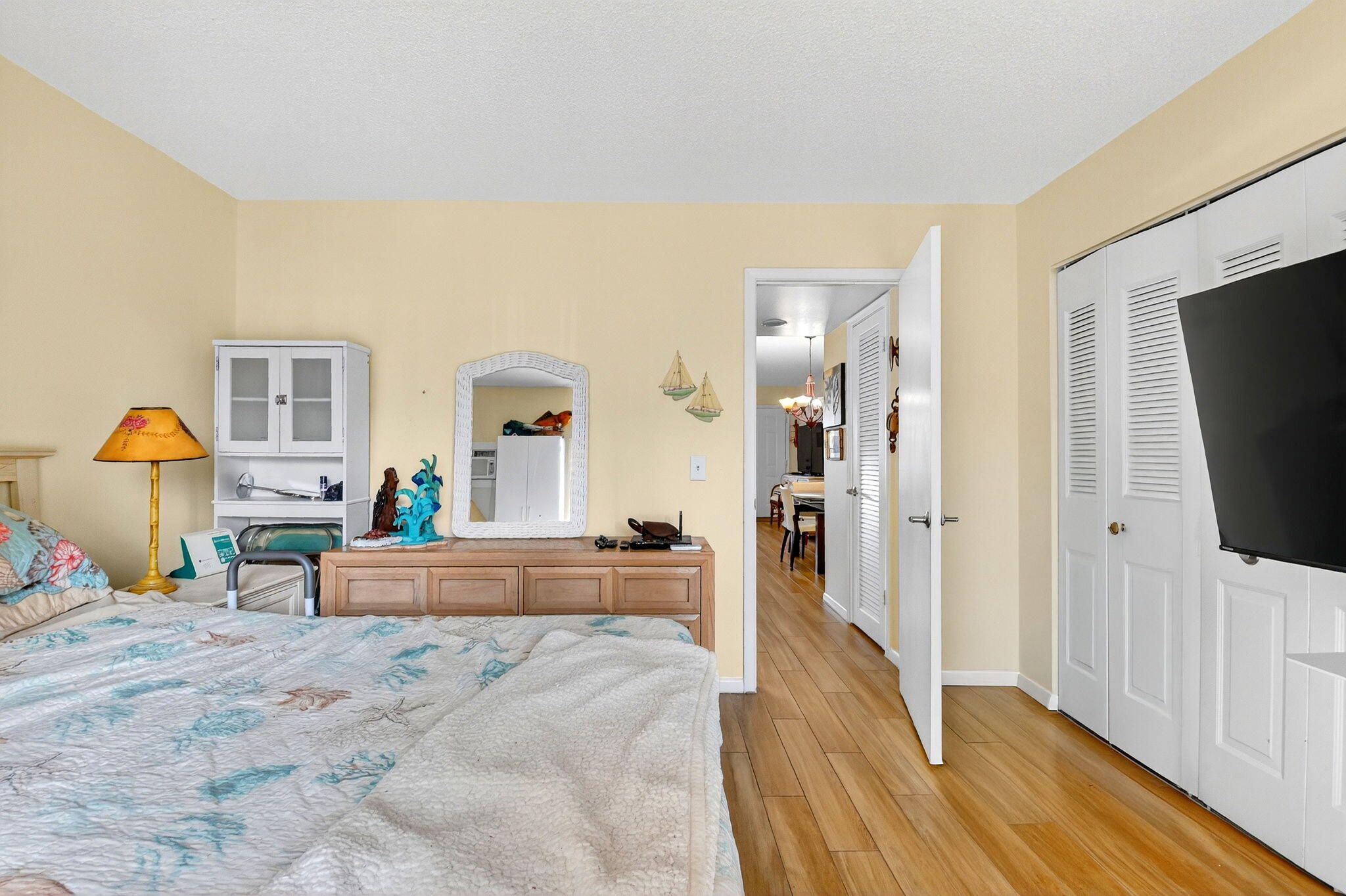 332 Northampton Q West Palm Beach, FL 33417 - Photo 17 of 42 a living room with furniture and a flat screen tv