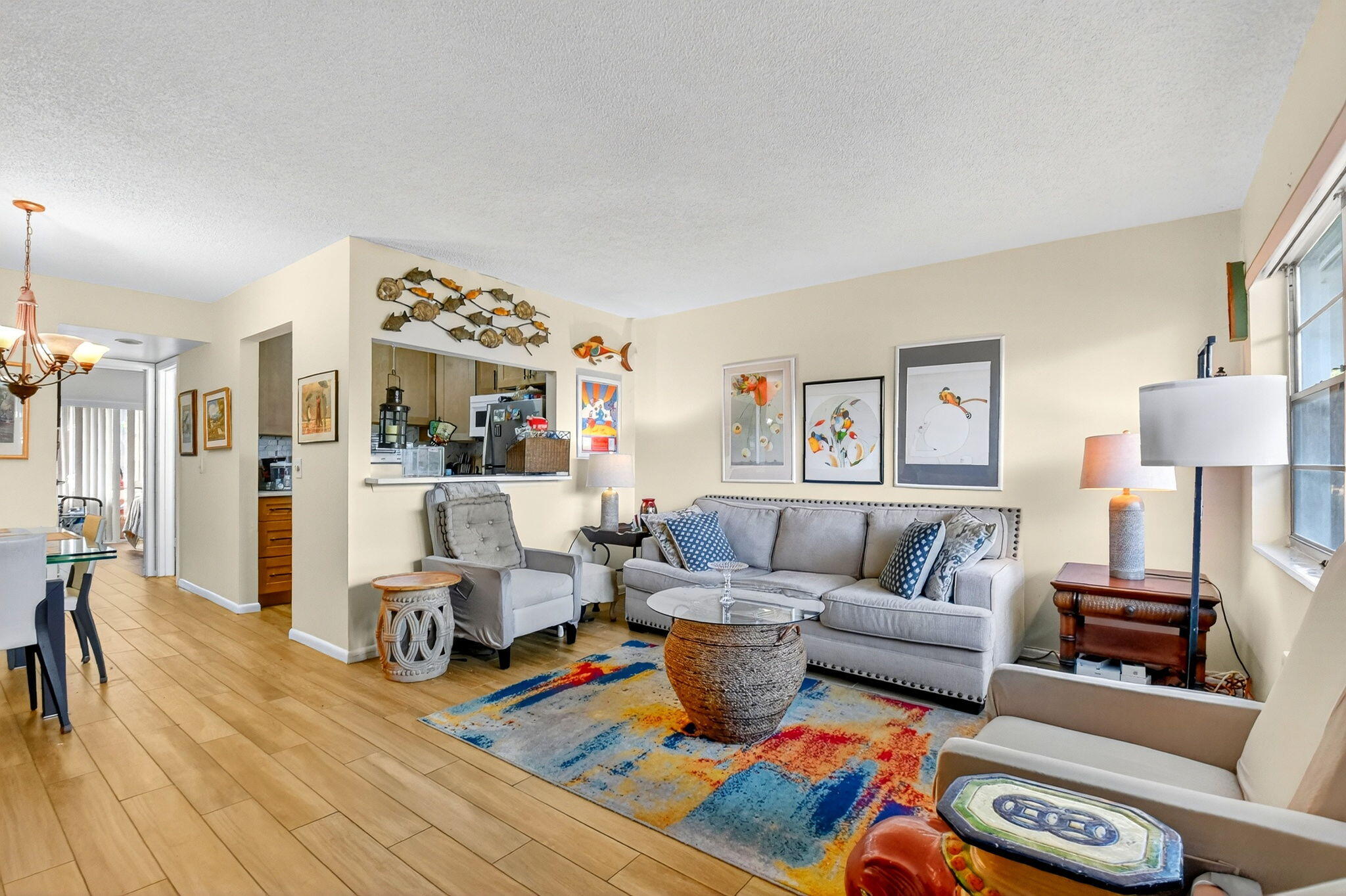 332 Northampton Q West Palm Beach, FL 33417 - Photo 3 of 42 a living room with furniture and a wooden floor