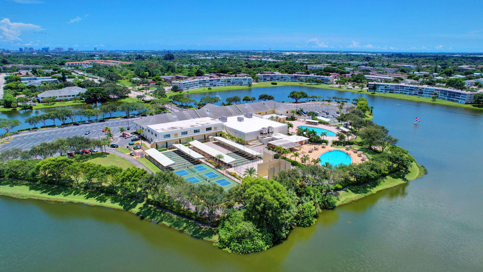 332 Northampton Q West Palm Beach, FL 33417 - Photo 32 of 42 an aerial view of a house with a lake view
