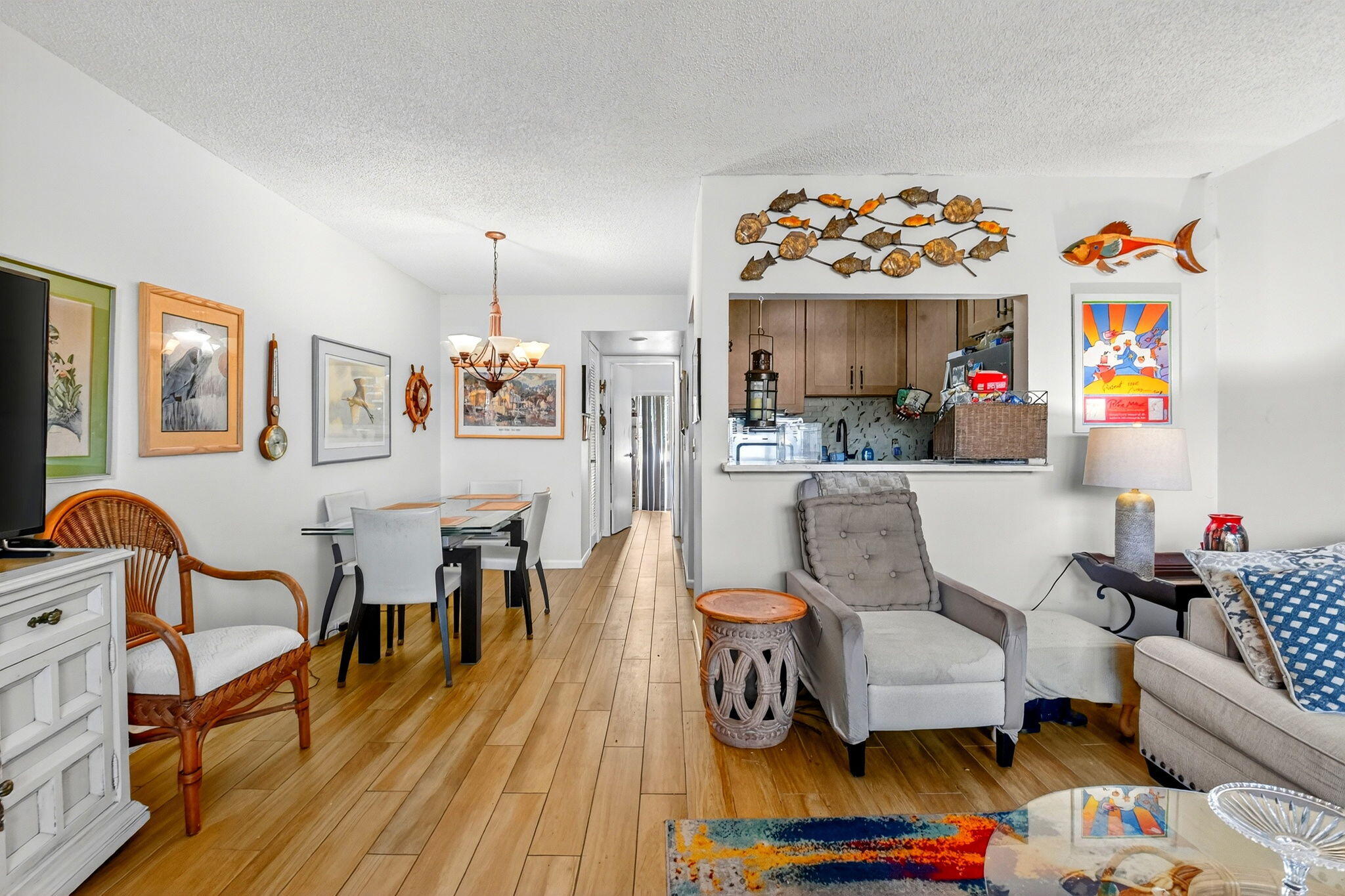 332 Northampton Q West Palm Beach, FL 33417 - Photo 6 of 42 a living room with furniture and a wooden floor