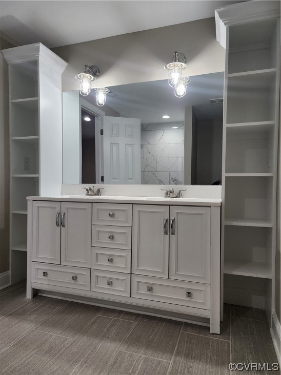 2813 Parkdale Road North Chesterfield, VA 23234 - Photo 22 of 36 a bathroom with a double vanity sink and a mirror