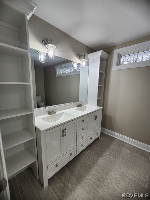 2813 Parkdale Road North Chesterfield, VA 23234 - Photo 23 of 36 a bathroom with a double vanity sink and mirror