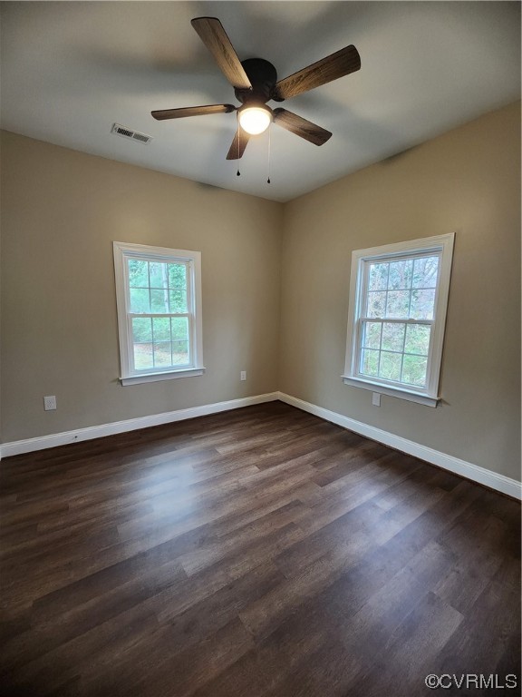 2813 Parkdale Road North Chesterfield, VA 23234 - Photo 25 of 36 an empty room with wooden floor chandelier and windows