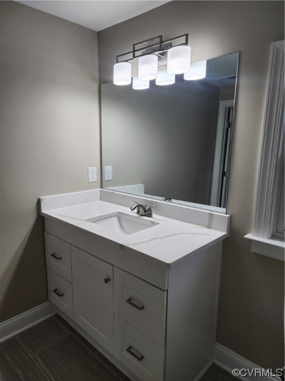 2813 Parkdale Road North Chesterfield, VA 23234 - Photo 28 of 36 a bathroom with a sink and a mirror