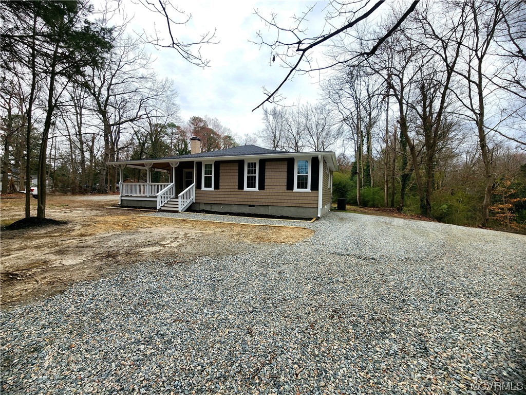 2813 Parkdale Road North Chesterfield, VA 23234 - Photo 31 of 36 a front view of house with yard and trees around