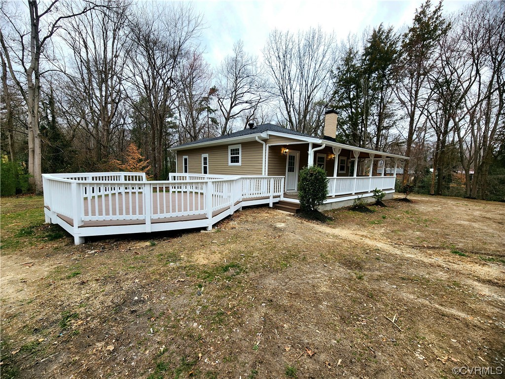 2813 Parkdale Road North Chesterfield, VA 23234 - Photo 33 of 36 a white house that has a big tree and wooden fence