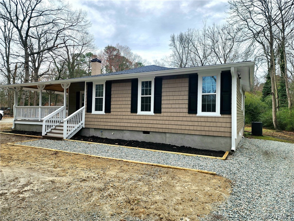 2813 Parkdale Road North Chesterfield, VA 23234 - Photo 4 of 36 a view of a house with a large window and wooden fence