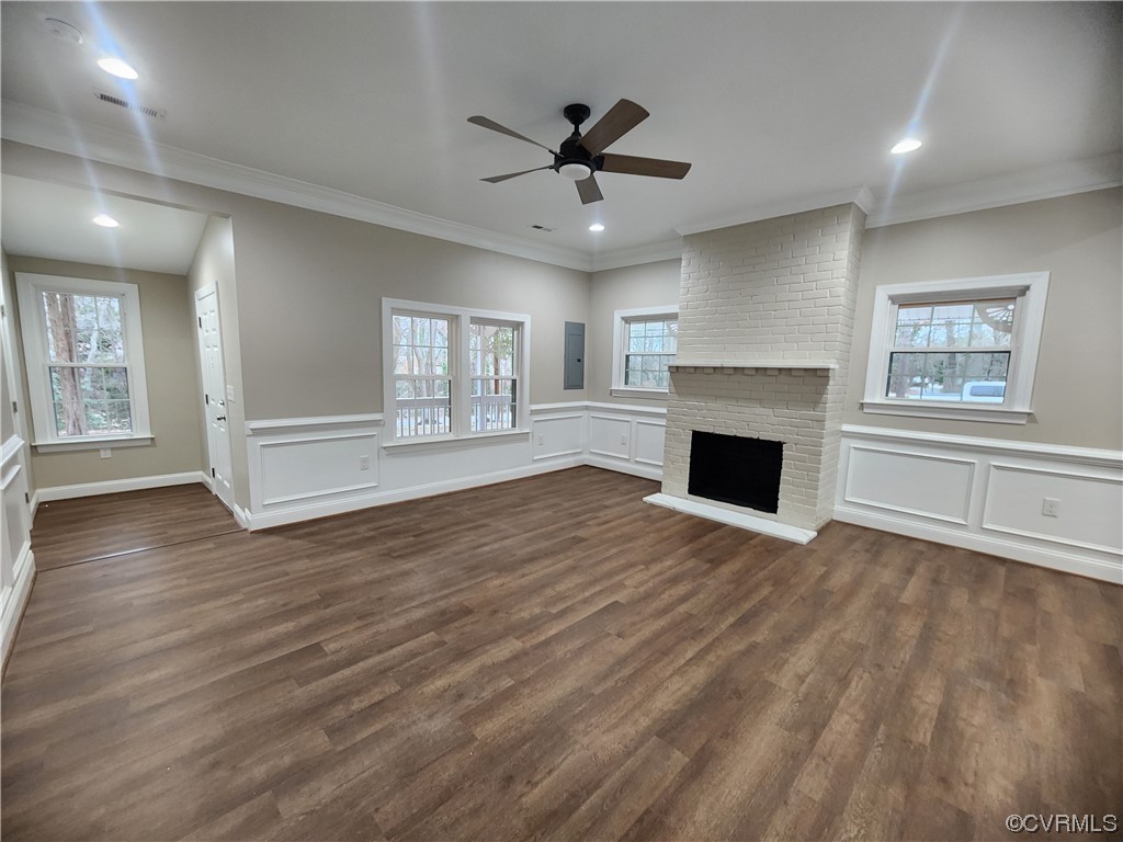 2813 Parkdale Road North Chesterfield, VA 23234 - Photo 8 of 36 an empty room with wooden floor fireplace and windows