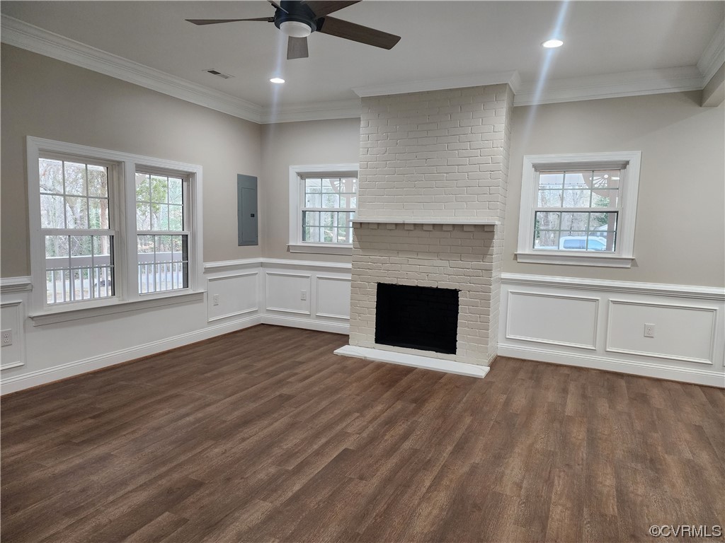 2813 Parkdale Road North Chesterfield, VA 23234 - Photo 9 of 36 a view of an empty room with wooden floor fireplace and a window