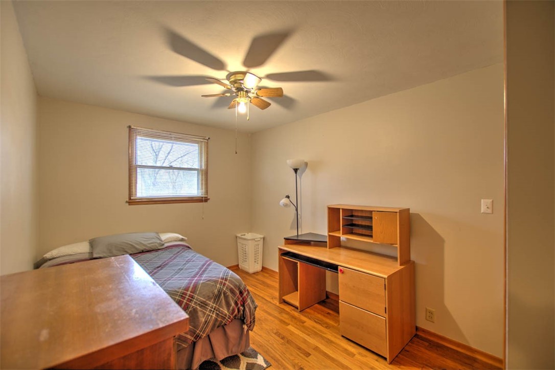6155 Camp Warren Road Decatur, IL 62521 - Photo 11 of 18 a view of a workspace with furniture and a window
