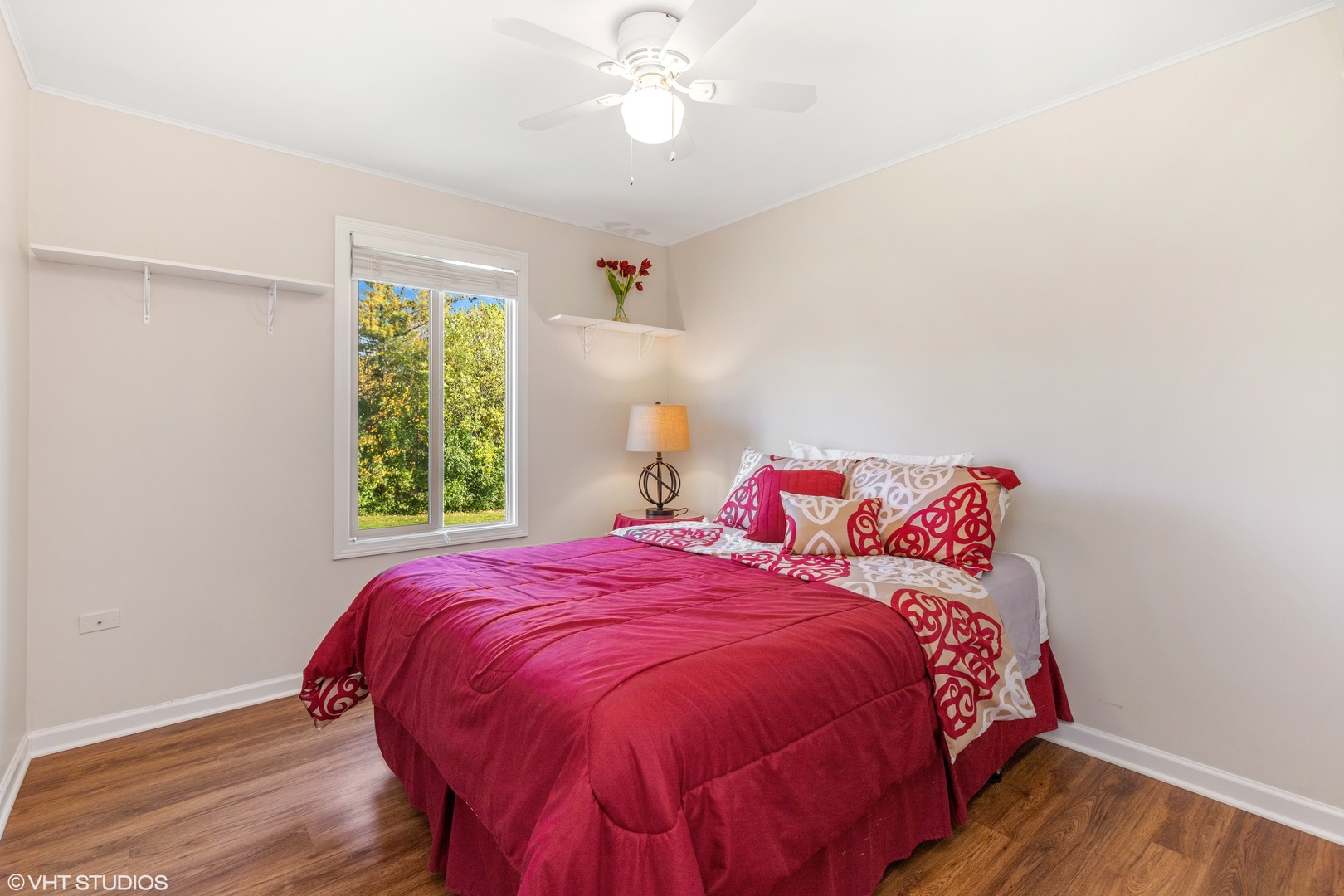 575 Forest View Road Lindenhurst, IL 60046 - Photo 12 of 21 a bedroom with a bed and a window