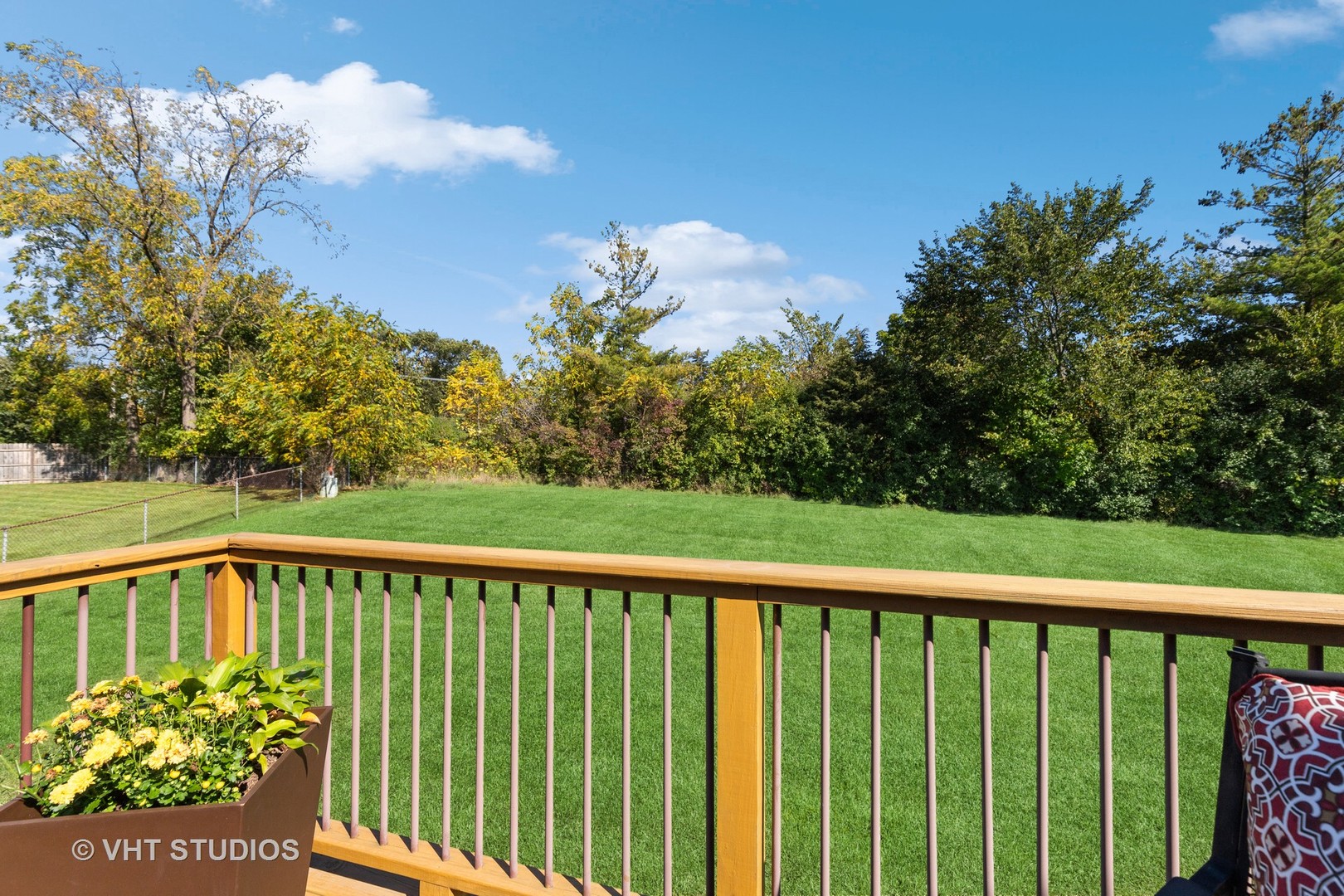 575 Forest View Road Lindenhurst, IL 60046 - Photo 15 of 21 a view of a balcony with wooden fence