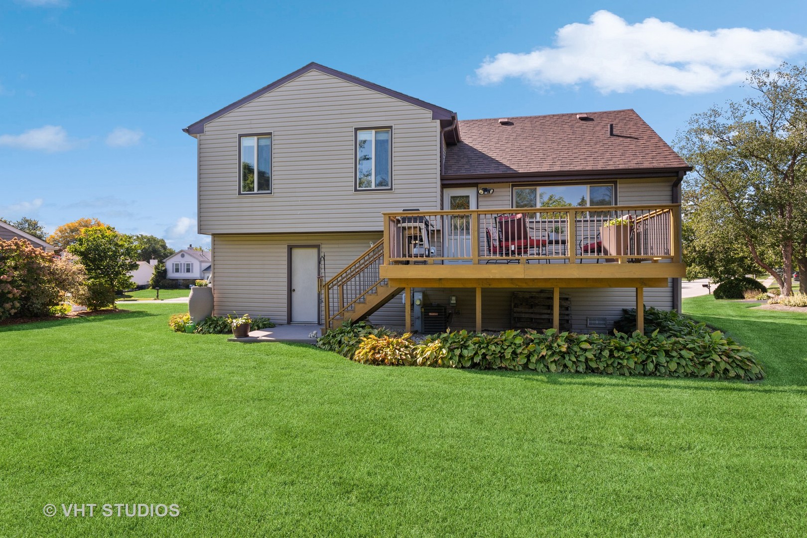 575 Forest View Road Lindenhurst, IL 60046 - Photo 17 of 21 a front view of house with yard and green space
