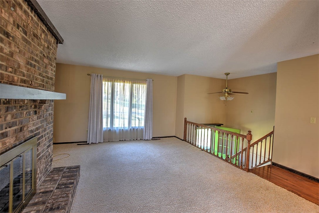 3441 Ferris Drive Decatur, IL 62521 - Photo 10 of 30 a view of livingroom with furniture and fireplace