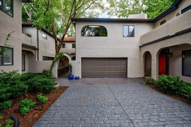 a front view of a house with yard