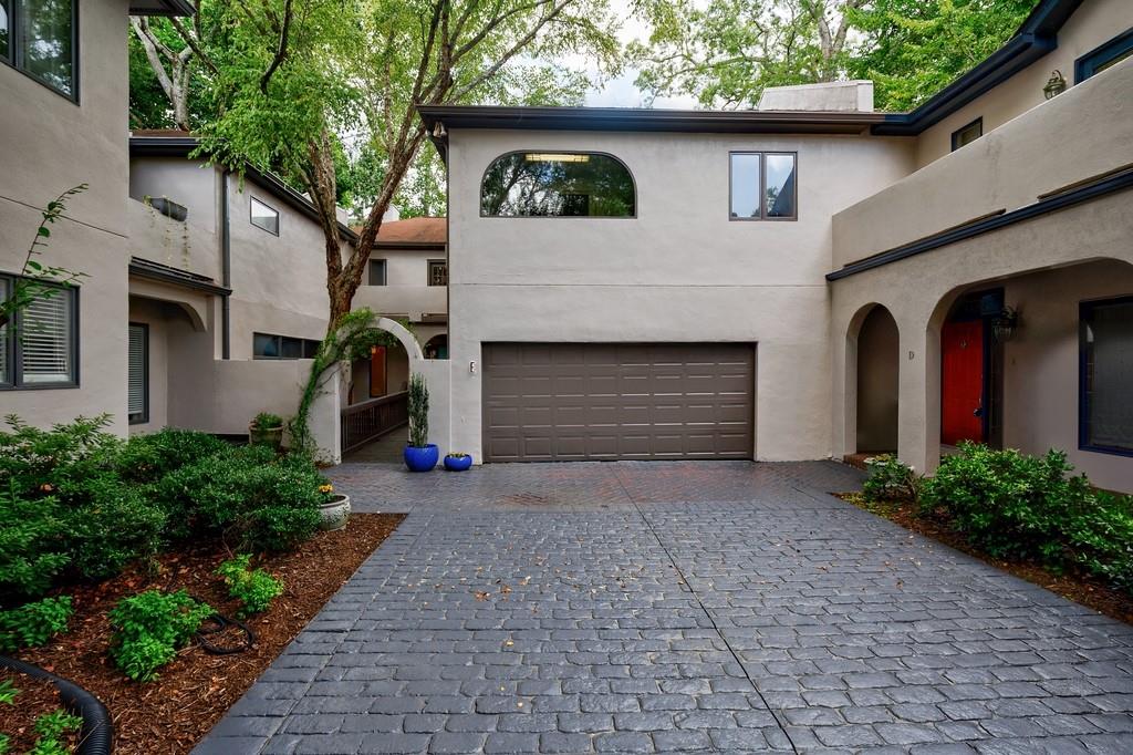 a front view of a house with yard