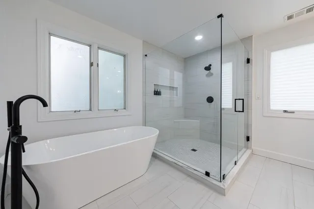 a view of empty room with a fireplace