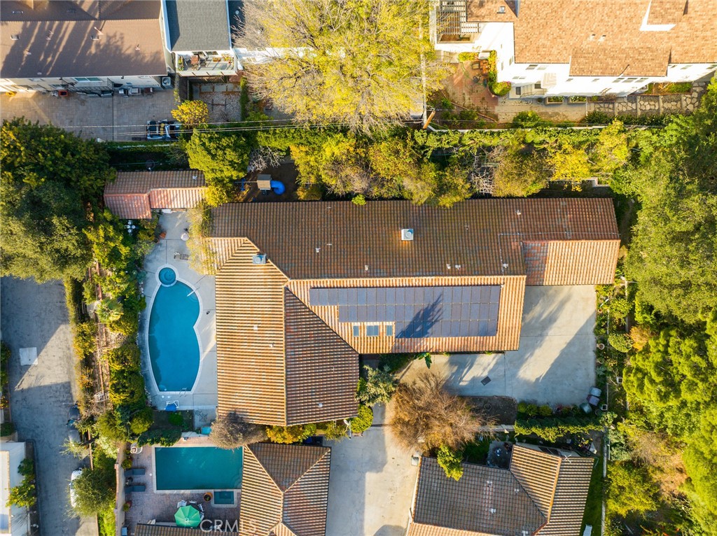 an aerial view of house with yard