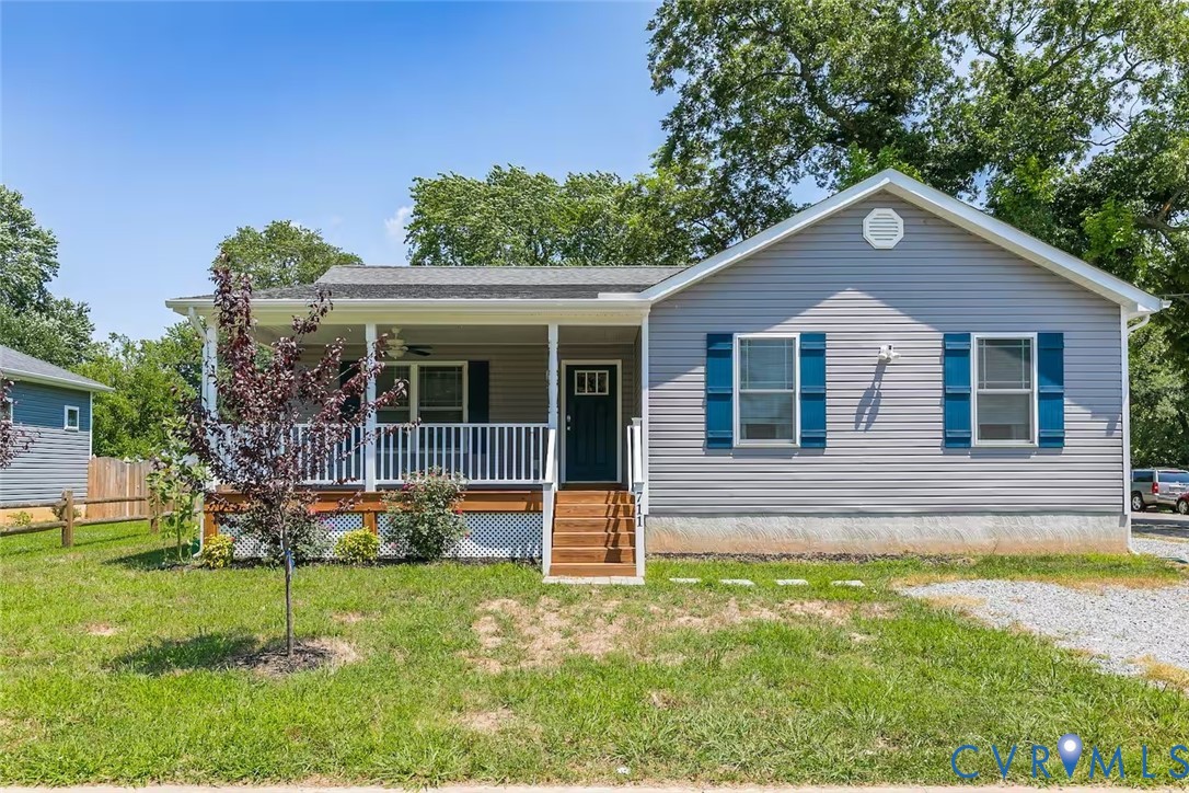 711 Jackson Street Colonial Beach, VA 22443 - Photo 2 of 41 a view of house with a yard