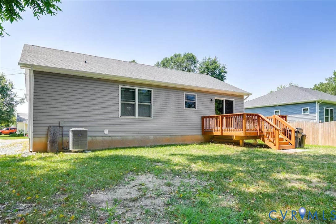 711 Jackson Street Colonial Beach, VA 22443 - Photo 39 of 41 a view of a house with a yard and porch