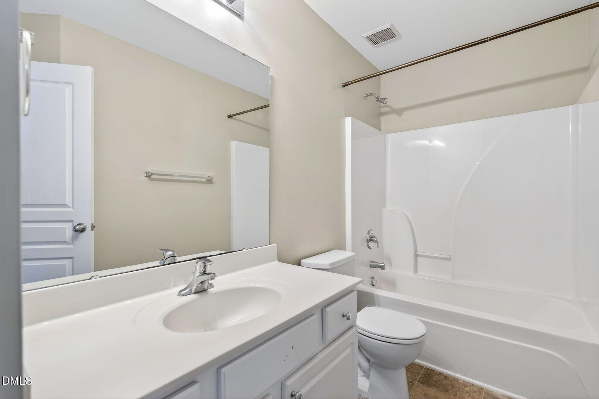 4523 Pale Moss Drive Raleigh, NC 27606 - Photo 32 of 42 a bathroom with a sink toilet vanity and shower