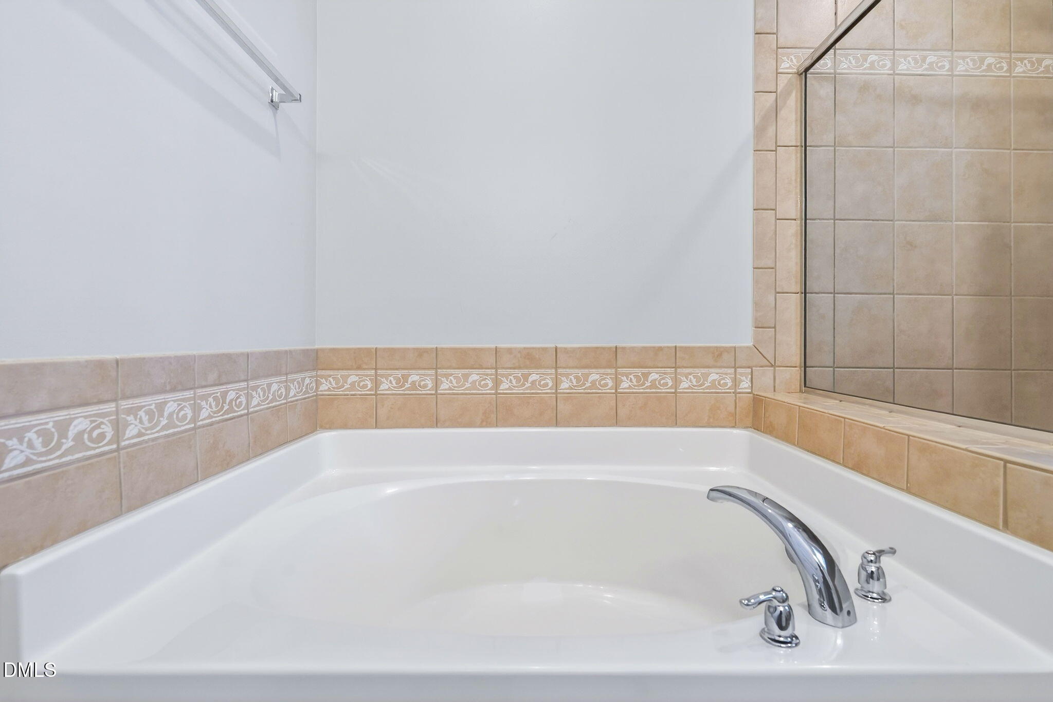 4523 Pale Moss Drive Raleigh, NC 27606 - Photo 38 of 42 a bath tub sitting next to a window