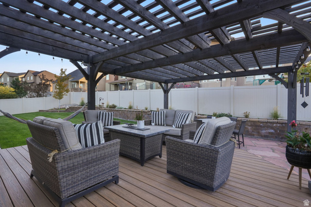 14738 Tangle Hill Road Herriman, UT 84096 - Photo 59 of 66 Spacious outdoor living area featuring a large wooden pergola over a composite deck