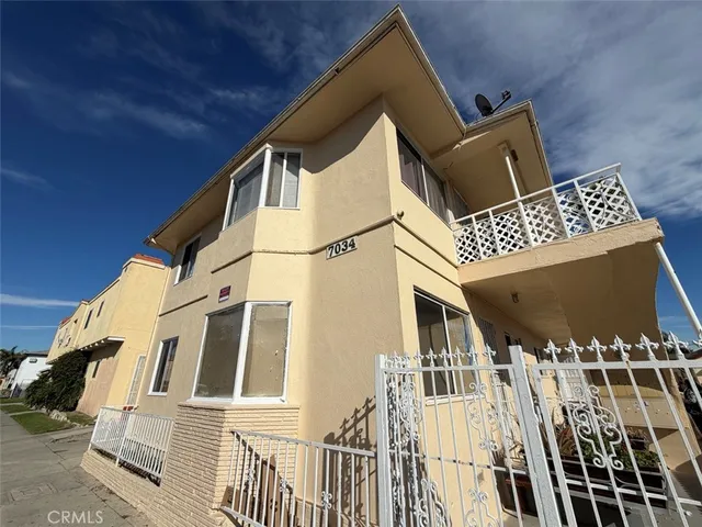 a view of a house with a street