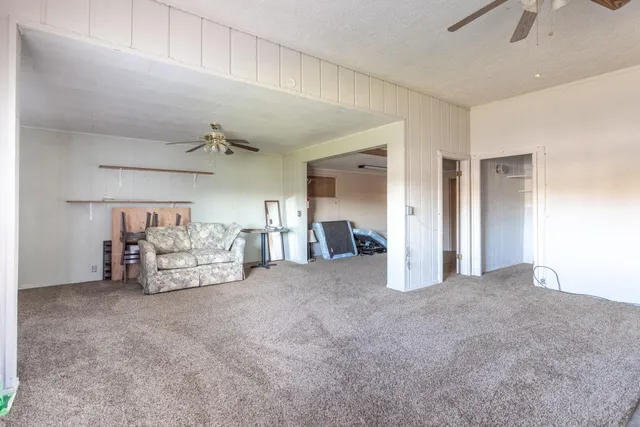 a view of a livingroom with furniture