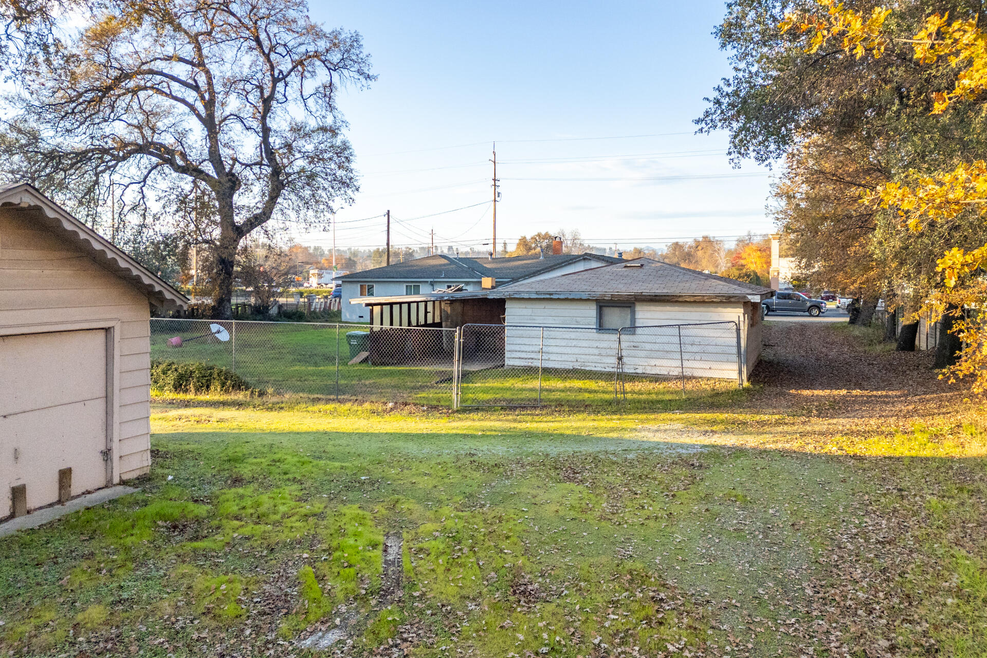 2381 South Bonnyview Road Redding, CA 96001 - Photo 19 of 26 a view of a house with a swimming pool