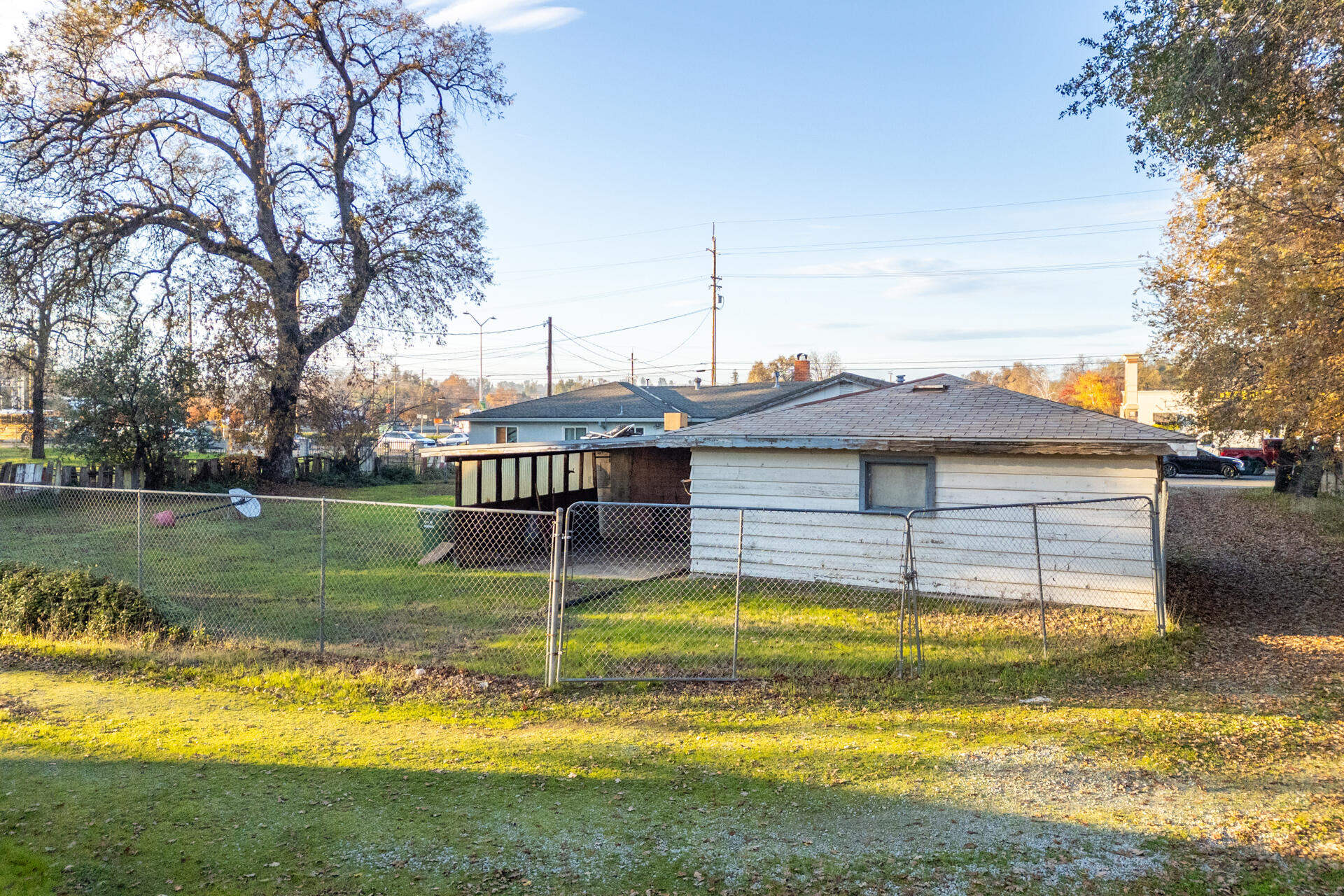 2381 South Bonnyview Road Redding, CA 96001 - Photo 20 of 26 a view of a house with a swimming pool