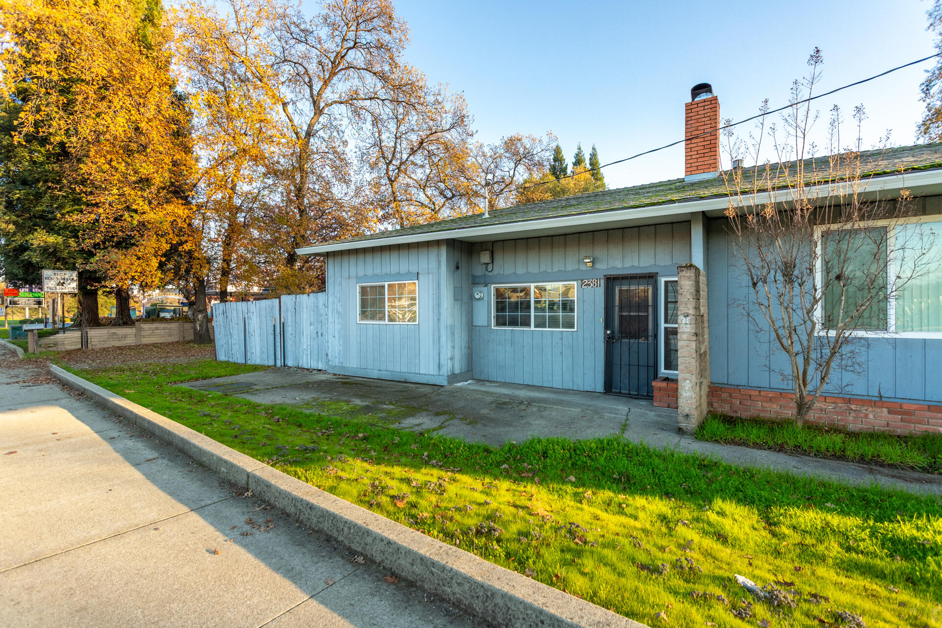 2381 South Bonnyview Road Redding, CA 96001 - Photo 24 of 26 a front view of a house with garden