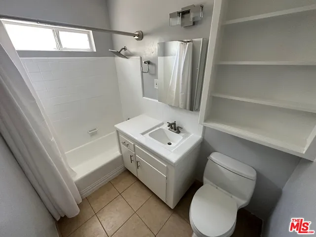 a bathroom with a sink and a bathtub