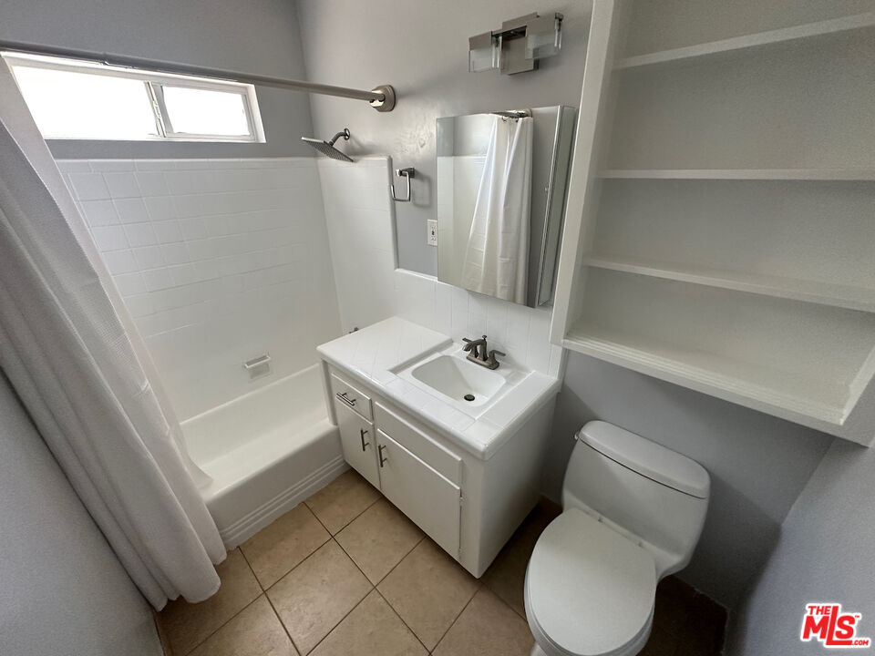 137 North Myrtle Avenue Monrovia, CA 91016 - Photo 22 of 41 a bathroom with a sink toilet and shower