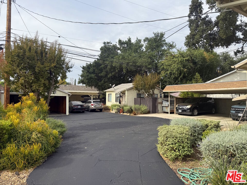 137 North Myrtle Avenue Monrovia, CA 91016 - Photo 32 of 41 a front view of a house with a yard and garage