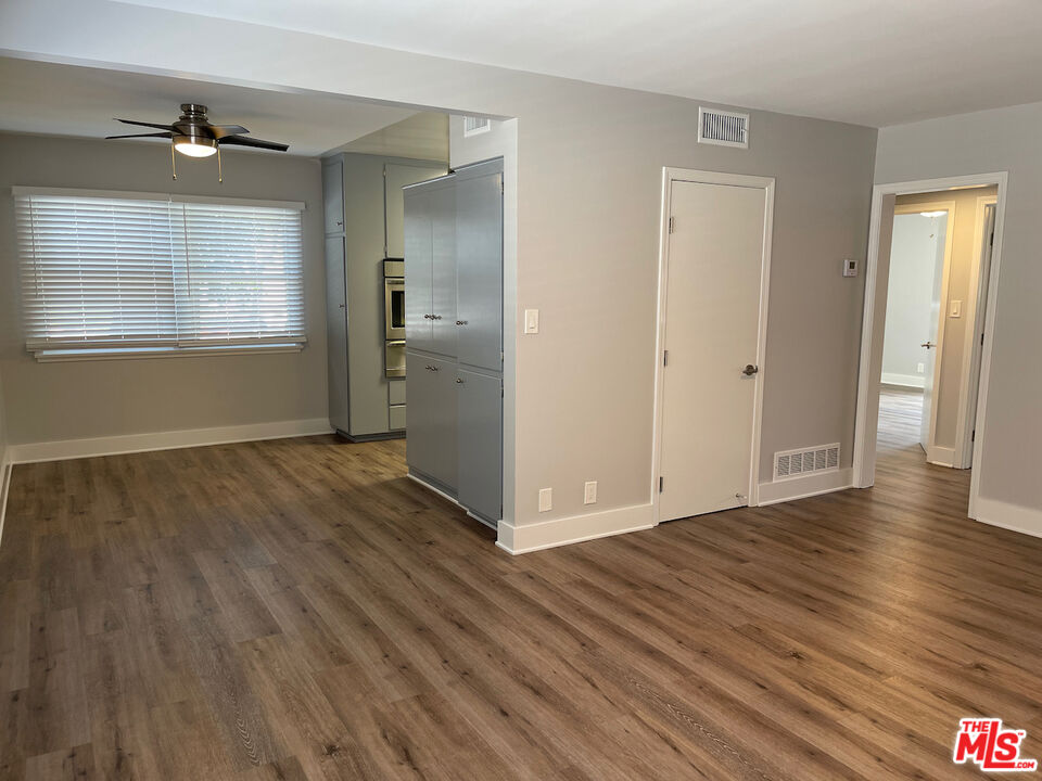 137 North Myrtle Avenue Monrovia, CA 91016 - Photo 38 of 41 a view of an empty room with wooden floor and a window