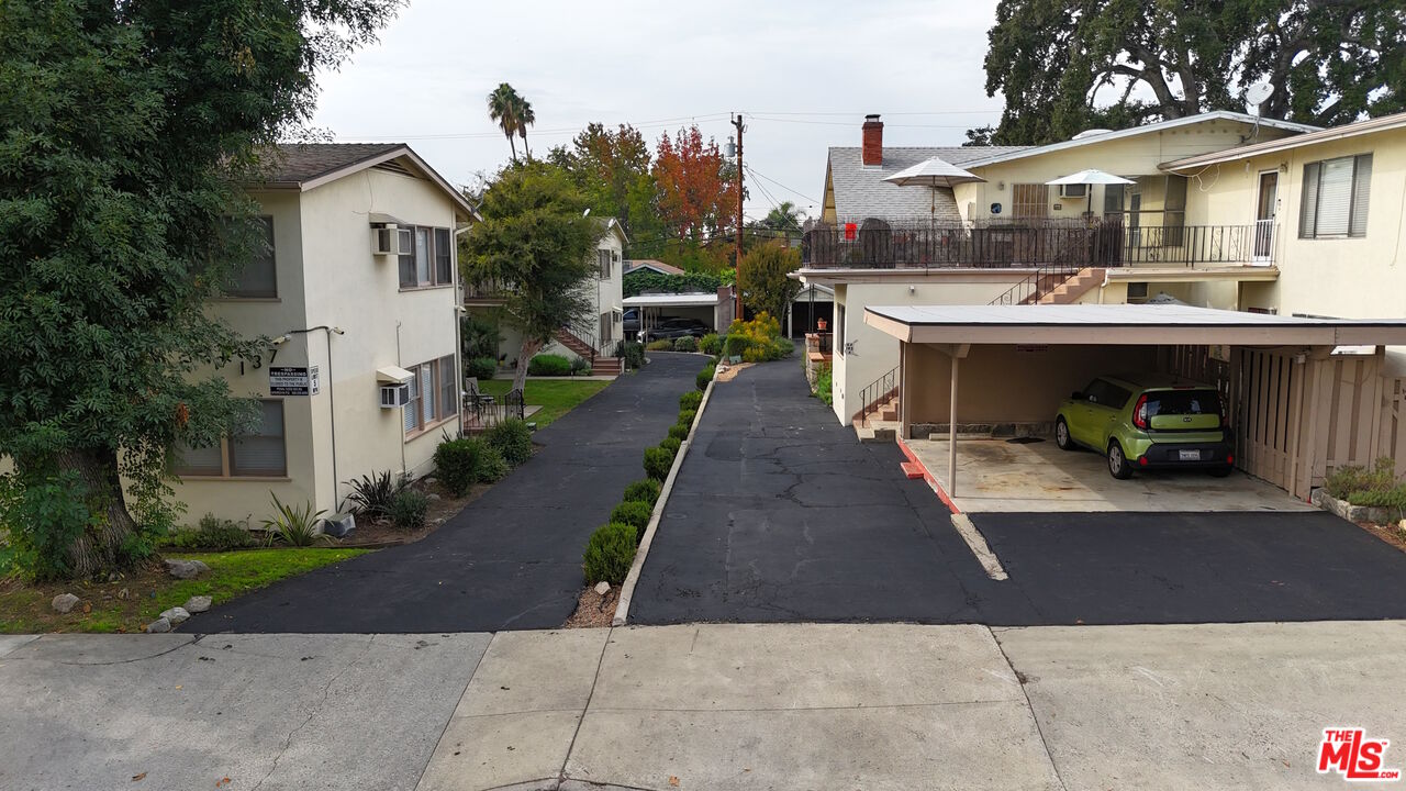 137 North Myrtle Avenue Monrovia, CA 91016 - Photo 10 of 41 a front view of a house with a garden