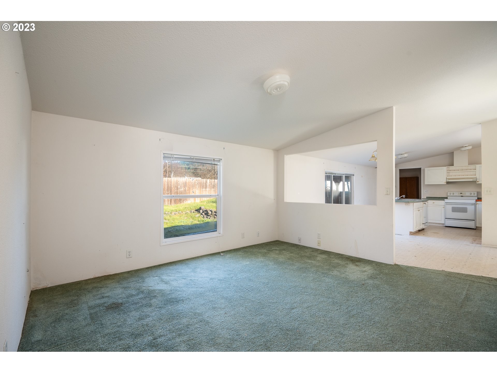 76367 Klohn Road Oakridge, OR 97463 - Photo 16 of 42 a view of an empty room and window